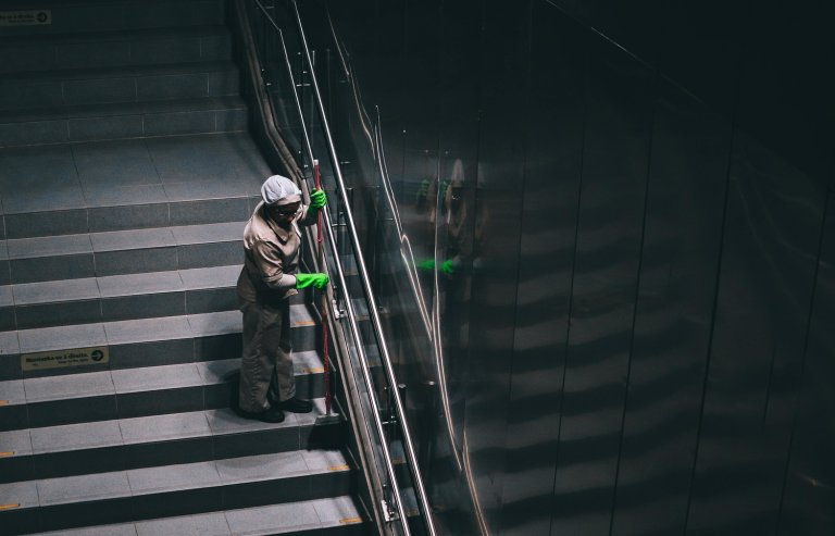 a person cleaning a stairway