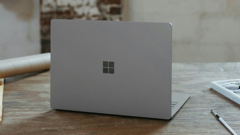 a microsoft laptop on a table