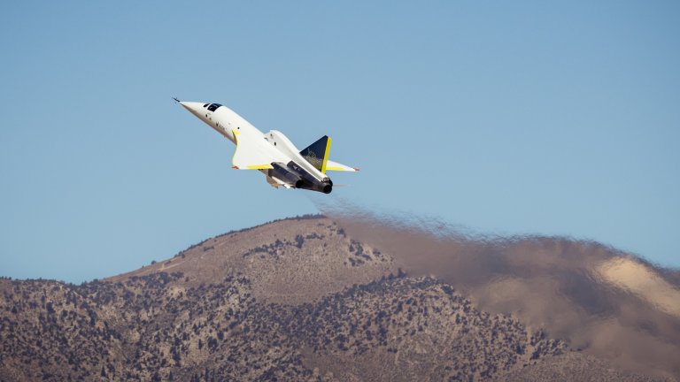 XB-1 plane taking off in desert