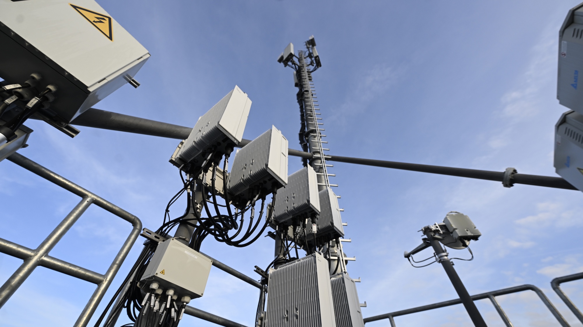 A new 5G cell tower stands on a high-rise building